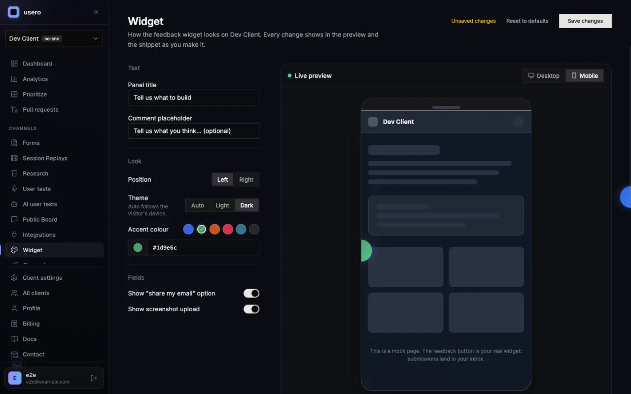 The same Usero Widget page with the preview switched to Mobile: a 390px phone frame showing the dark mock page with the green launcher on its left edge, and the control rail unchanged on the left.